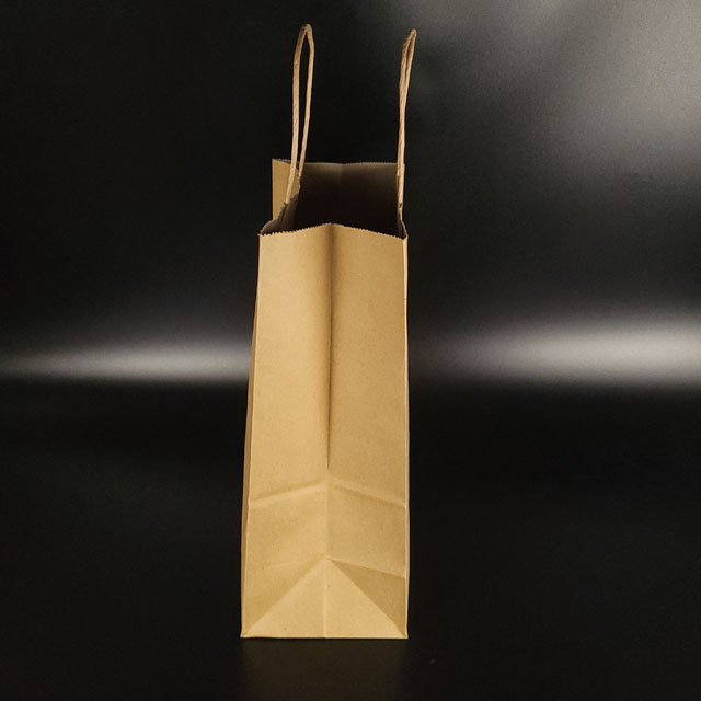 brown color paper bag with handle